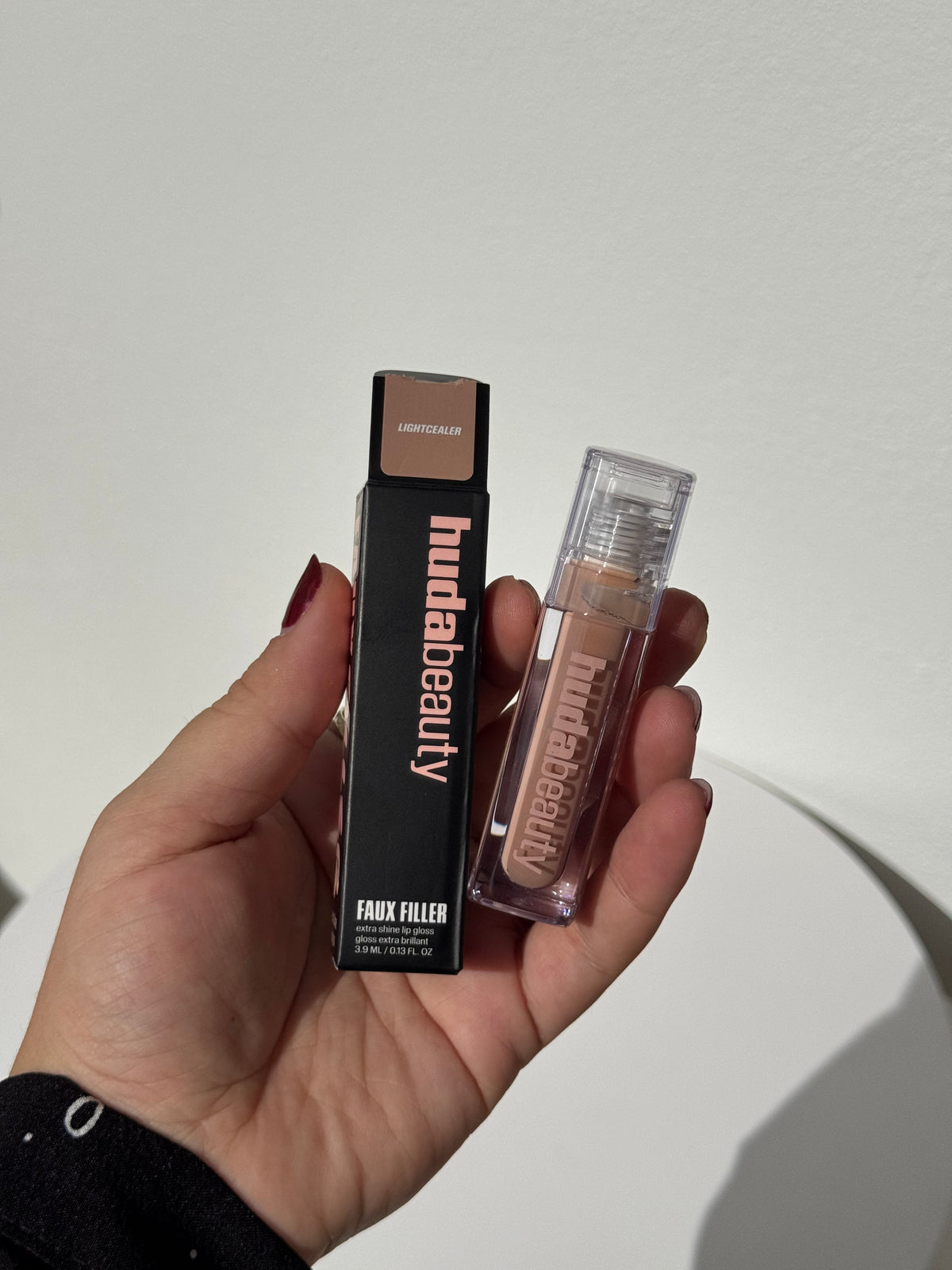 HUDA BEAUTY
Faux Filter Gloss