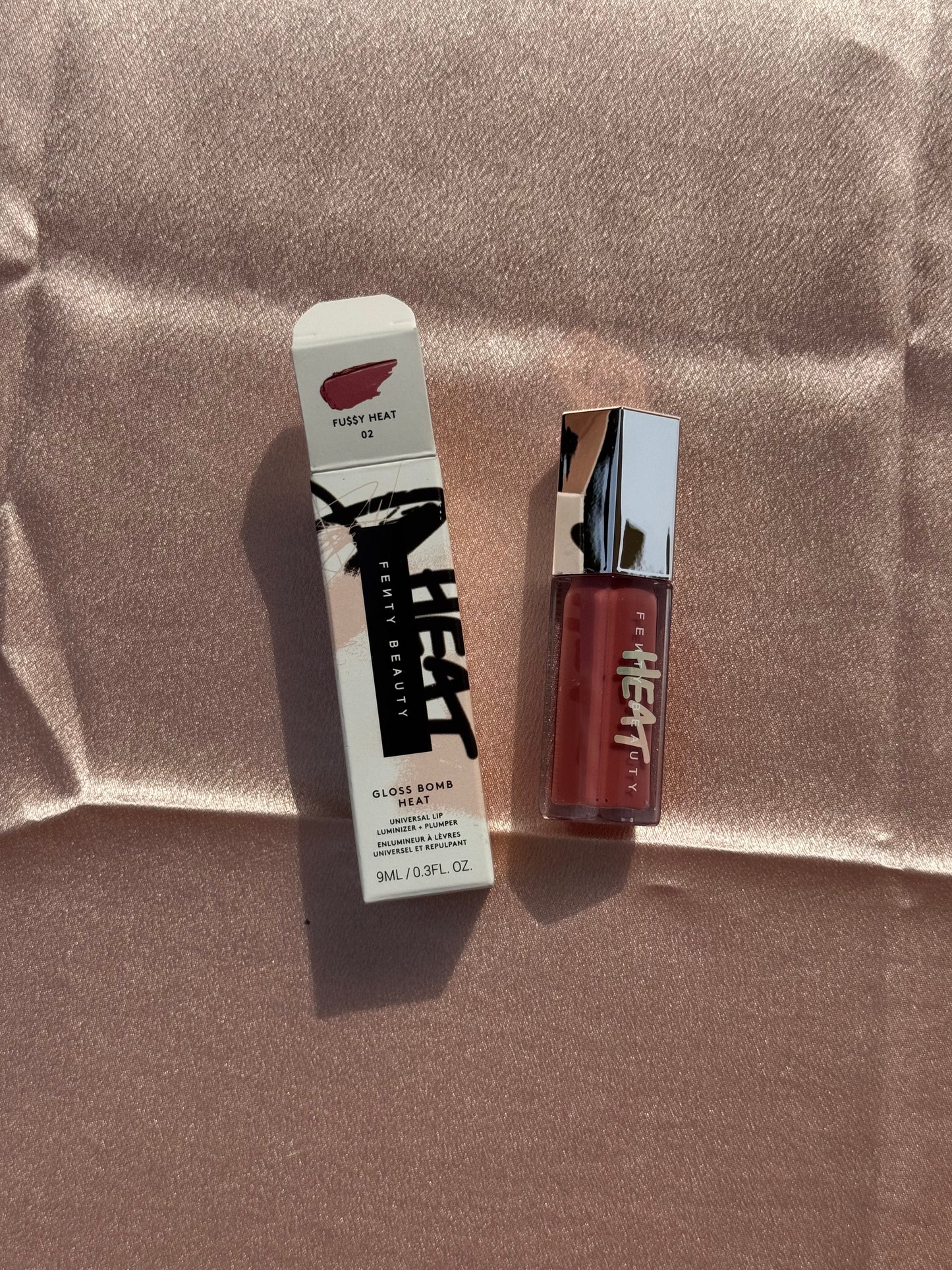 Fenty Beauty by Rihanna 
Gloss Bomb Heat Universal Lip Luminizer + Plumper