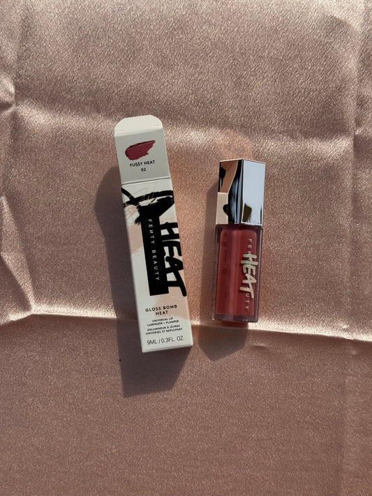 Fenty Beauty by Rihanna 
Gloss Bomb Heat Universal Lip Luminizer + Plumper