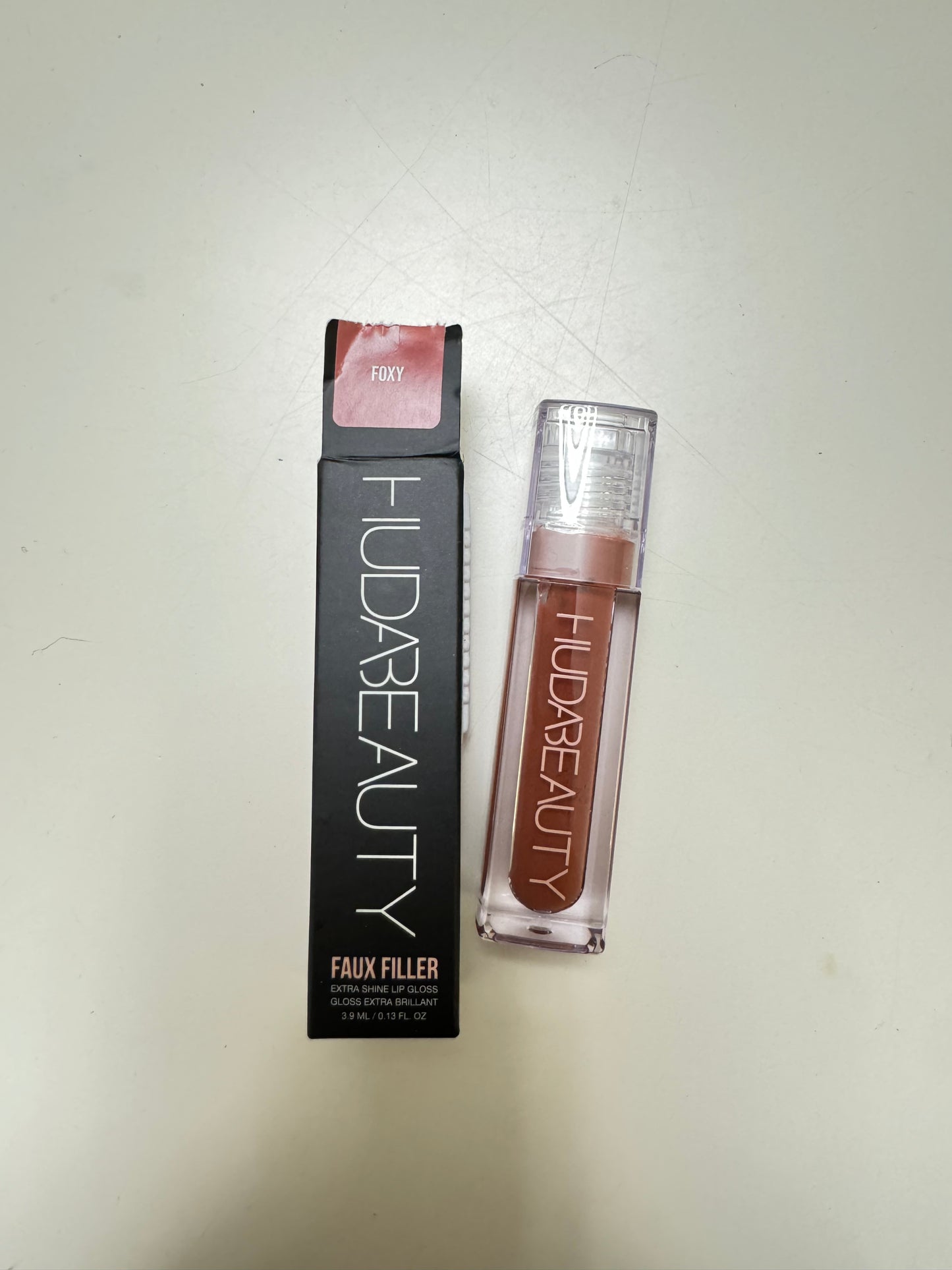 HUDA BEAUTY
Faux Filler Shiny Non-Sticky Lip Gloss