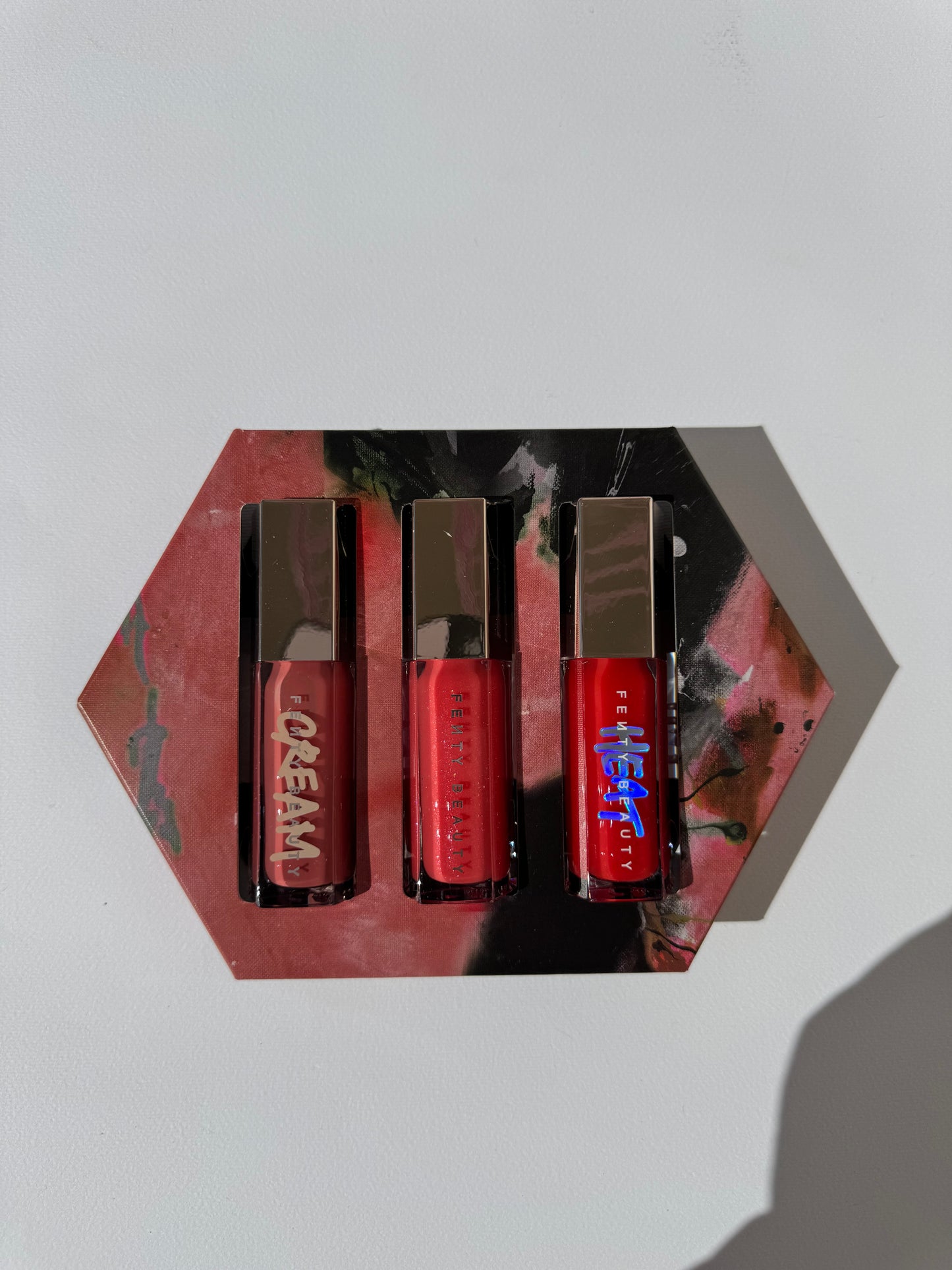 Fenty Beauty by Rihanna
Glossy Posse VII Full-Size Gloss Bomb Trio
Shade Fenty Glow & Dragon Mami & Hot Cherry