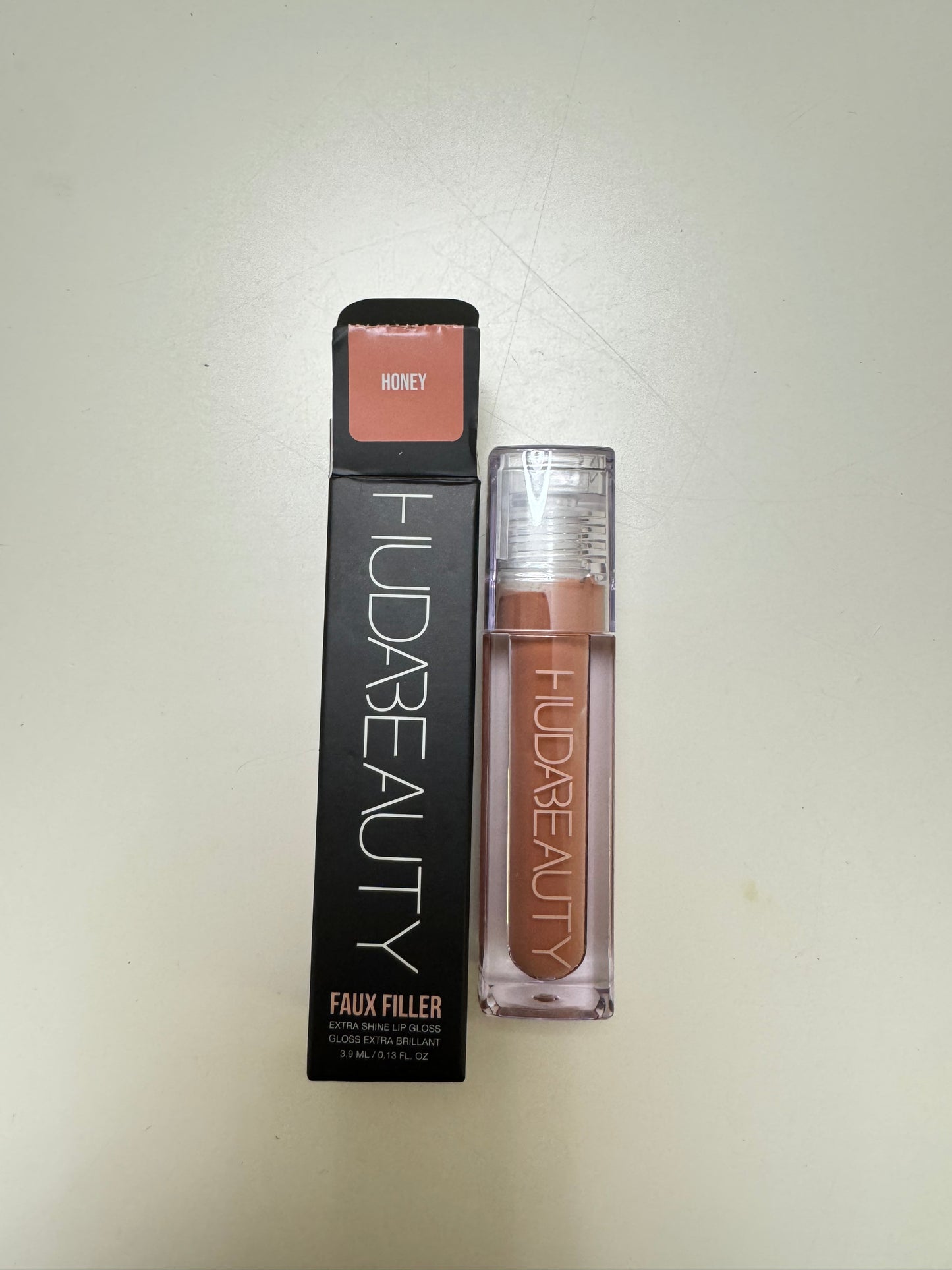 HUDA BEAUTY
Faux Filler Shiny Non-Sticky Lip Gloss