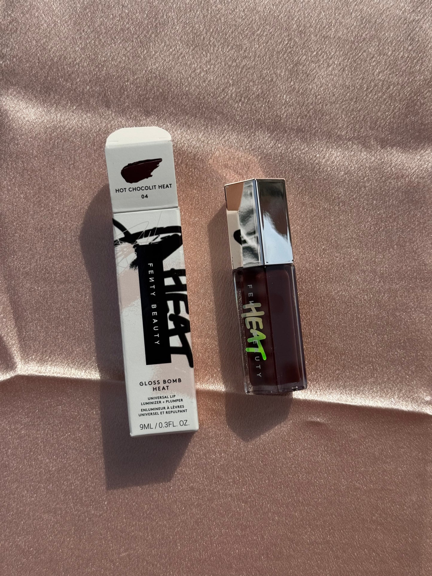 Fenty Beauty by Rihanna 
Gloss Bomb Heat Universal Lip Luminizer + Plumper