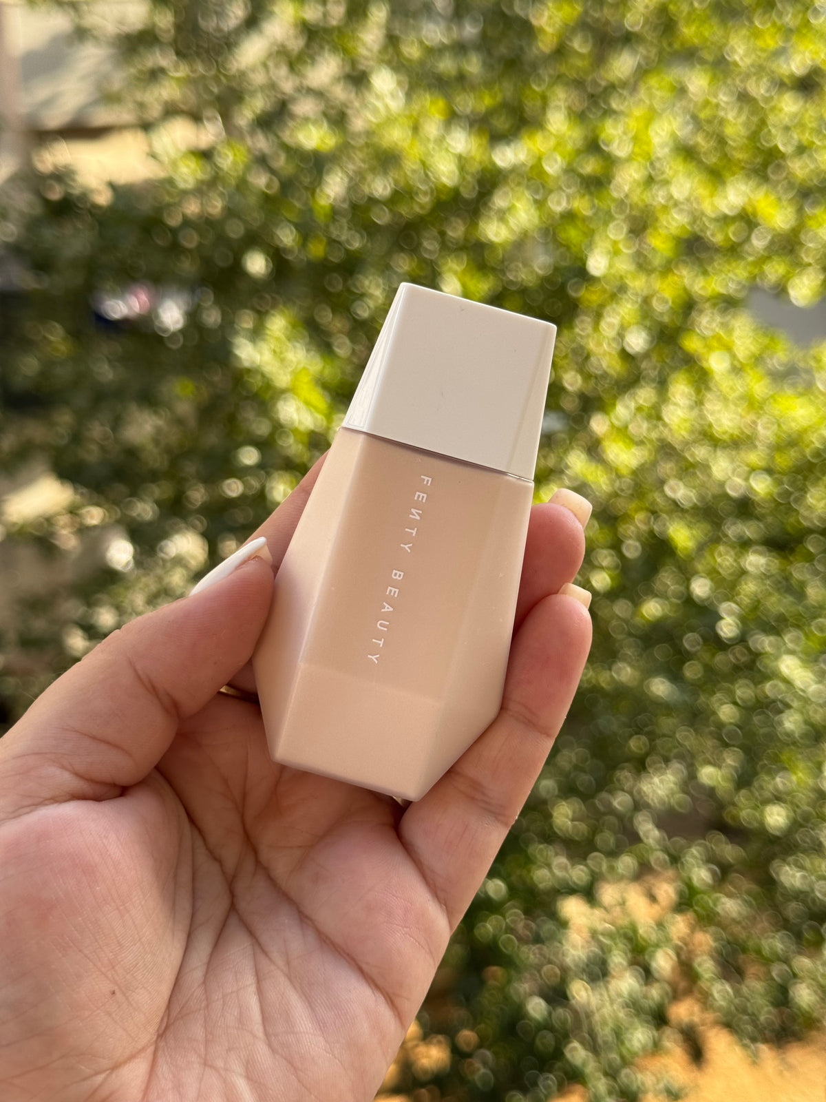 Fenty Beauty by Rihanna 
Eaze Drop Blurring Skin Tint