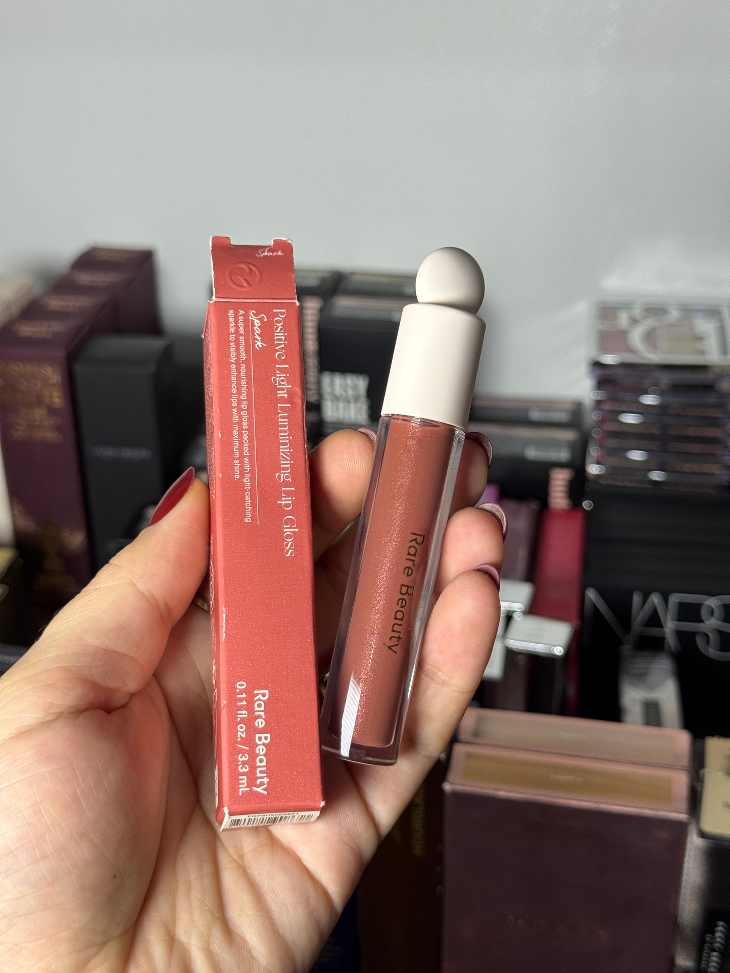 Rare Beauty by Selena Gomez
Positive Light Luminizing Lip Gloss