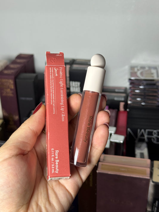 Rare Beauty by Selena Gomez
Positive Light Luminizing Lip Gloss