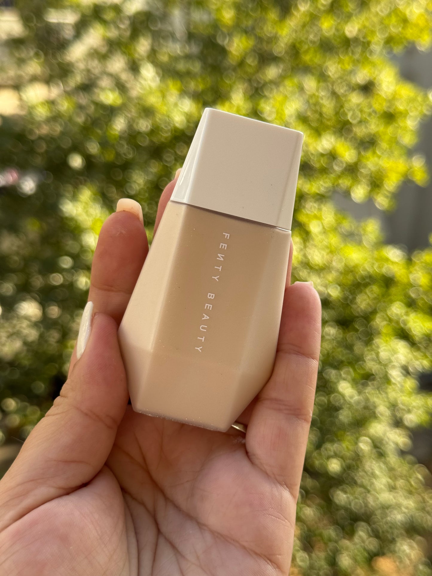Fenty Beauty by Rihanna 
Eaze Drop Blurring Skin Tint