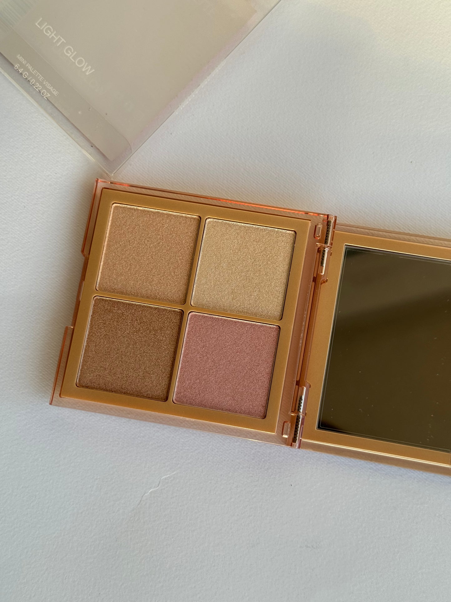 Huda Beauty 
Light Glow Obsessions Highlighter Palette